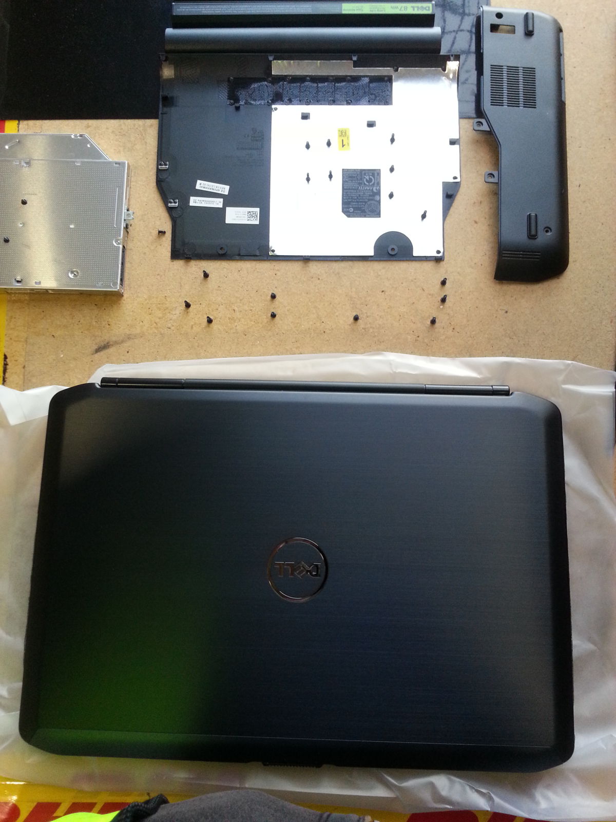 Top of Dell Latitude E5430v with screws laid out nicely